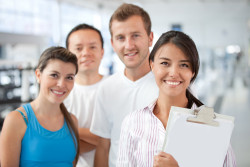 Gym manager showing the facilities to a group of people